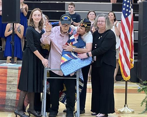 aging vet presented quilt at Liberty Middle